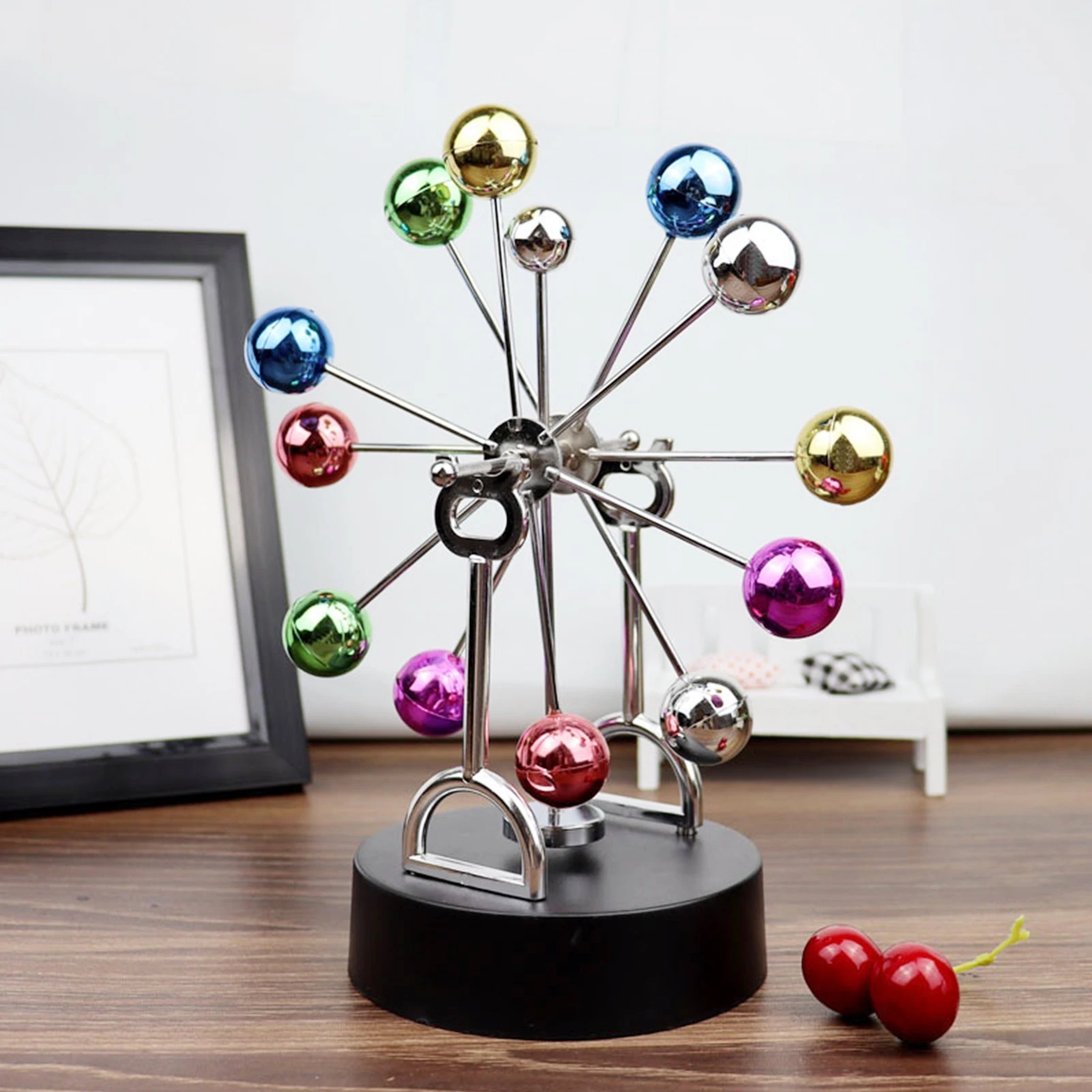Creative Rotating Ferris Wheel - مراجعة Newton Cradle Large وسعره