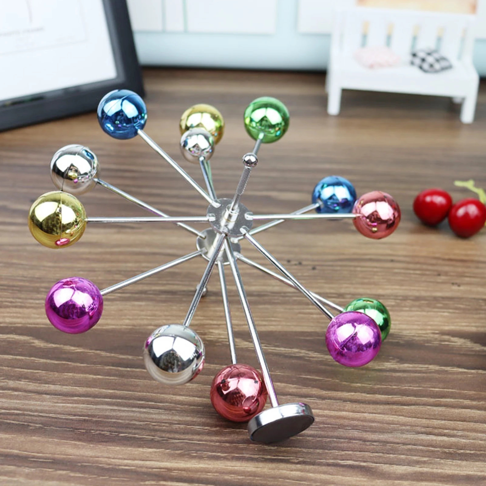 Creative Rotating Ferris Wheel - مراجعة Newton Cradle Large وسعره