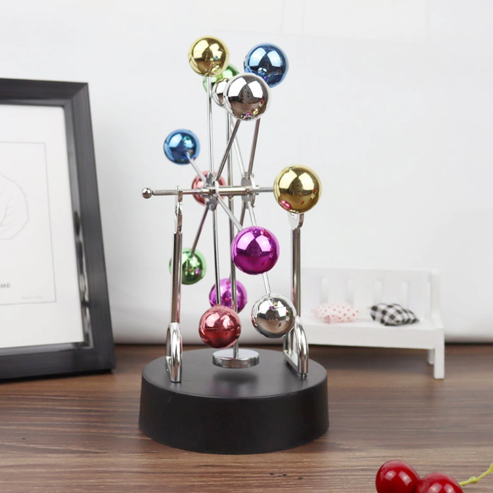 Creative Rotating Ferris Wheel - مراجعة Newton Cradle Large وسعره