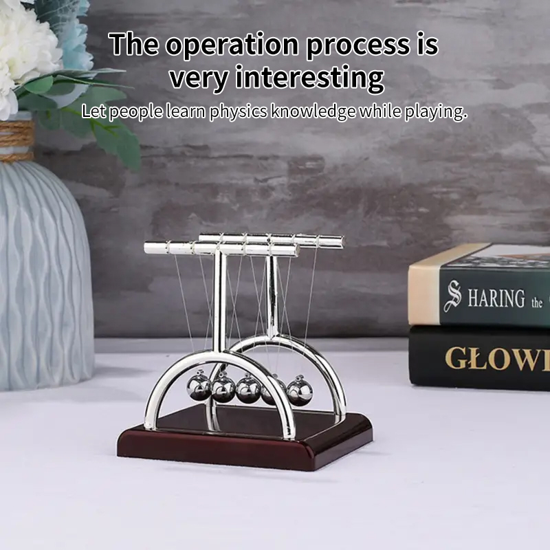 Newton Pendulum Balance Balls: - مراجعة Newton Cradle Large وسعره