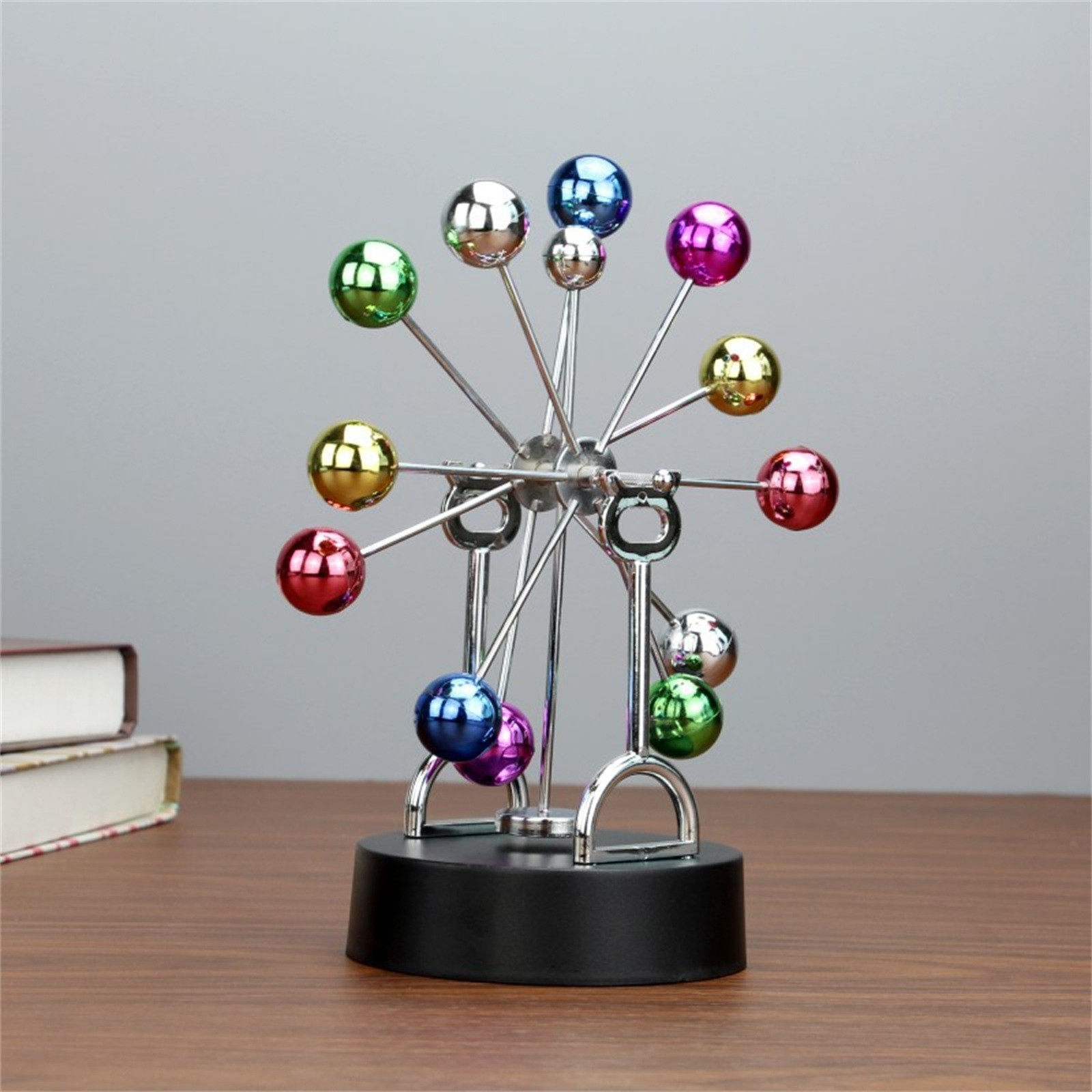 Ferris Wheel Perpetual Motion  - مراجعة Newton Cradle Large وسعره