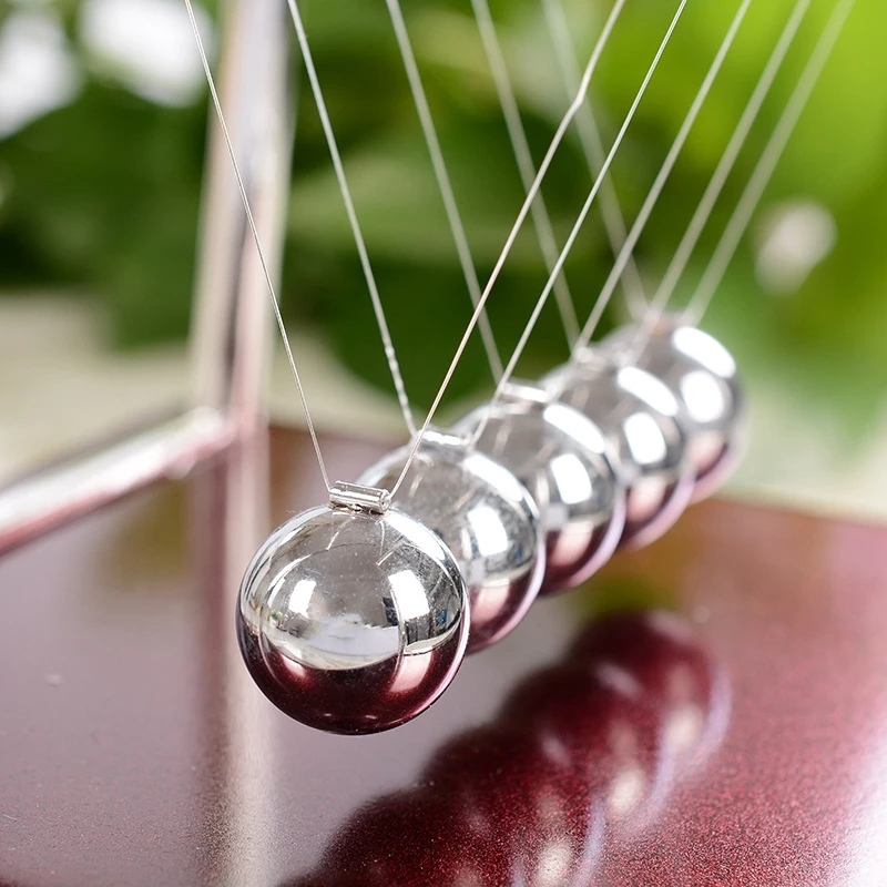 Newton's Cradle Desk Table Dec - مراجعة Newton Cradle Large وسعره